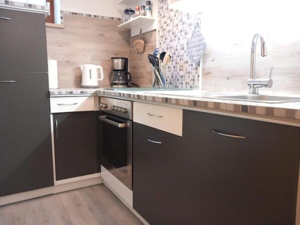 Fridge, oven, electric kettle, highchair