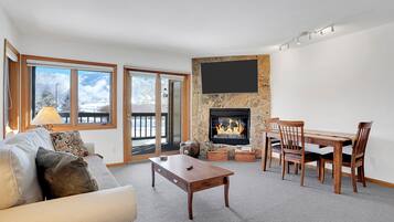 Smart TV, fireplace, books