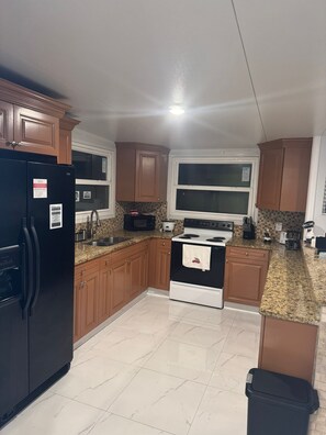 Fridge, microwave, oven, coffee/tea maker