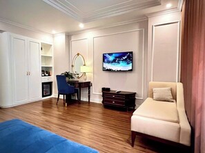 Luxury Double Room, City View | Minibar, individually decorated, desk, laptop workspace