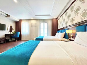 Deluxe Twin Room, City View | Minibar, individually decorated, desk, laptop workspace - Ruby Queen Hotel (Ha Long)