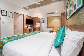 Standard Room | Individually furnished, desk, blackout drapes, iron/ironing board - Treebo MR Motel, 10 Mins To Airport (Iritty)