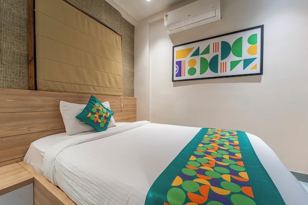 Economy Room | Individually furnished, desk, blackout drapes, iron/ironing board