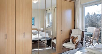 Ferienwohnung 'Tannenblick 8-1' mit Privatterrasse, Gemeinschaftsgarten und Wi-Fi