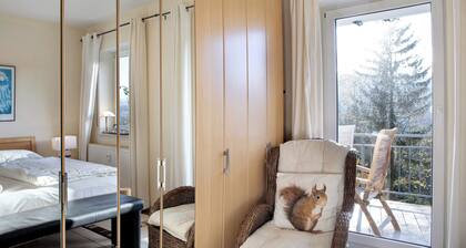 Ferienwohnung 'Tannenblick 8-1' mit Privatterrasse, Gemeinschaftsgarten und Wi-Fi