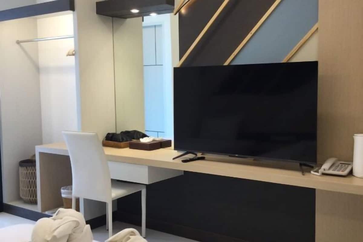 Desk, laptop workspace, blackout curtains, free WiFi