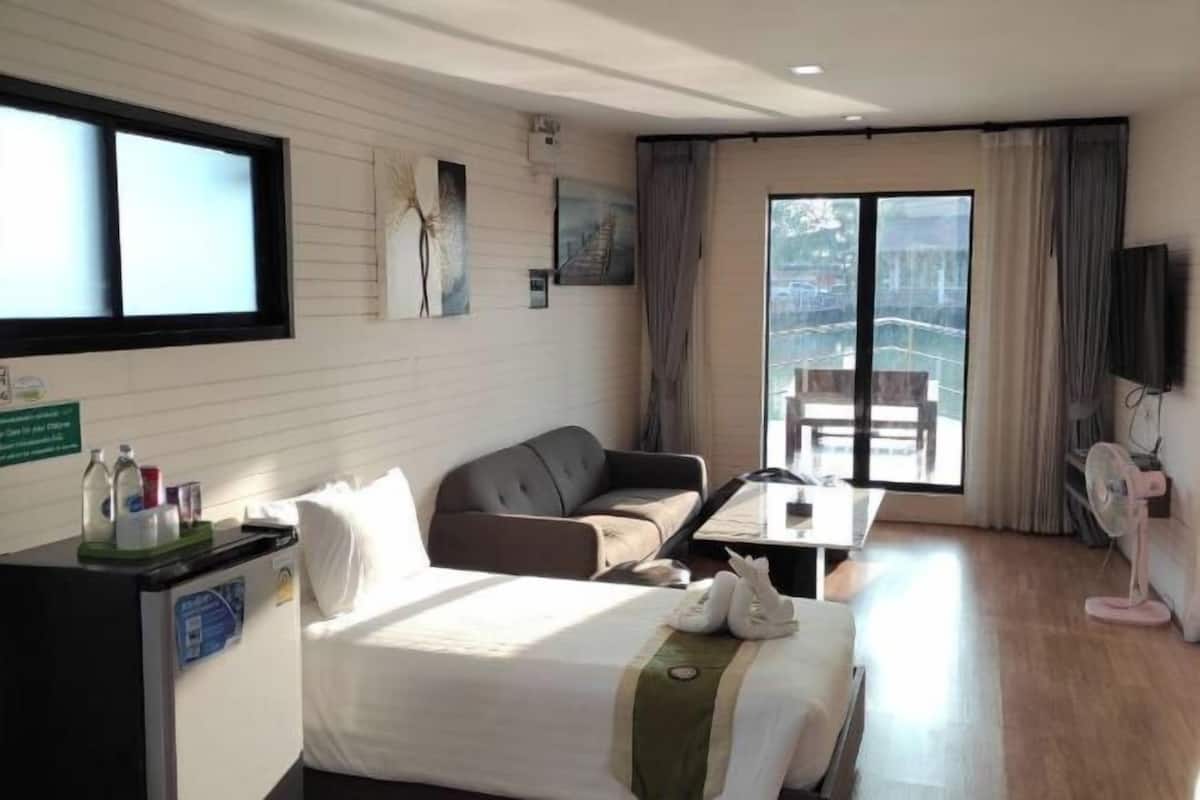 Desk, laptop workspace, blackout curtains, free WiFi