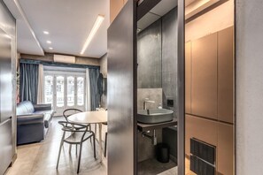 Leilighet – deluxe | Oppholdsområde | TV