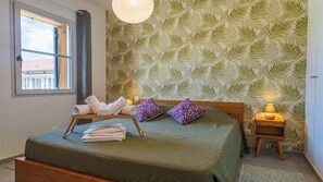 1 dormitorio, tabla de planchar con plancha, cuna de viaje y wifi