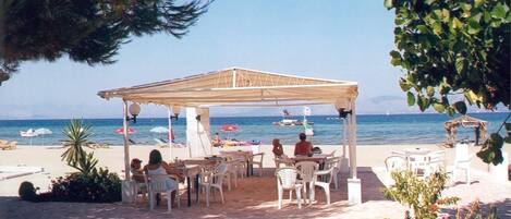 On the beach, sun loungers