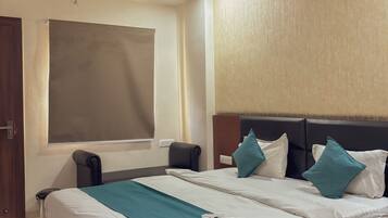 Desk, laptop workspace, blackout curtains, free WiFi