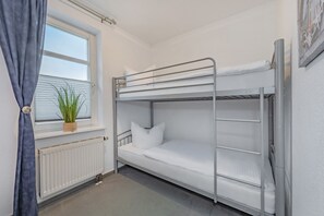 2 quartos, berço de viagem, Wi-Fi de cortesia, roupa de cama