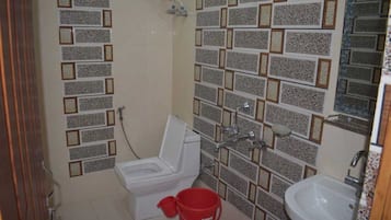 Shower, free toiletries, towels, soap