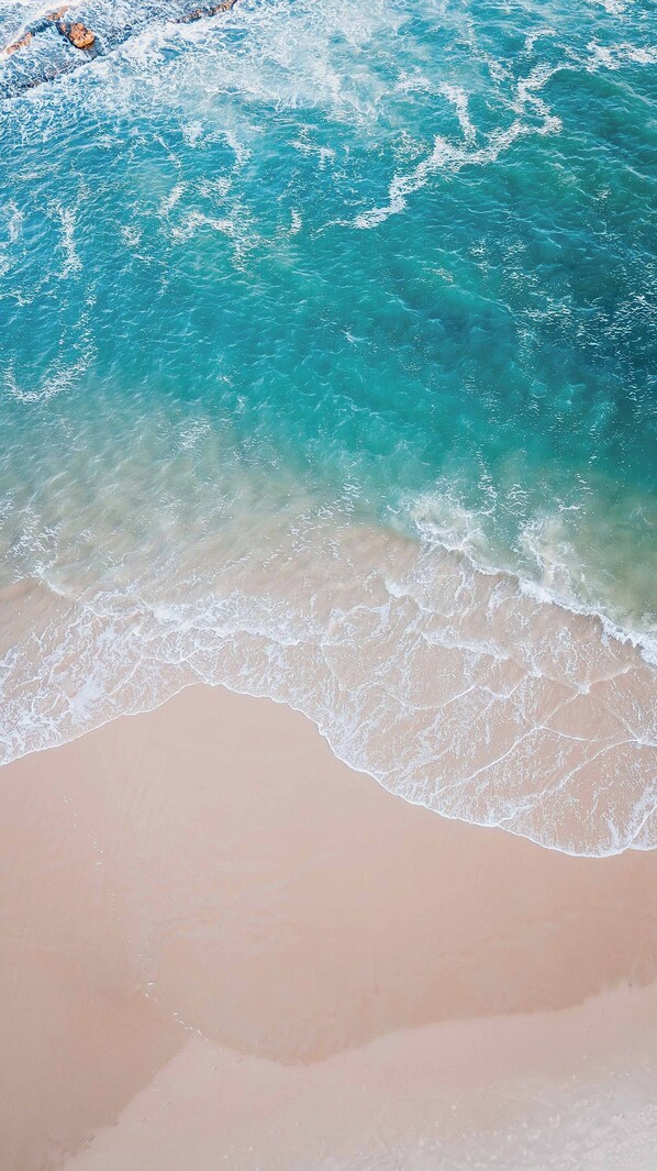 Am Strand, weißer Sandstrand