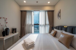 Deluxe Apartment, 1 Bedroom, Balcony, City View | Living area | 40-inch flat-screen TV with cable channels, Netflix, streaming services - The Galleria Residence by Hava  (Ho Chi Minh City)