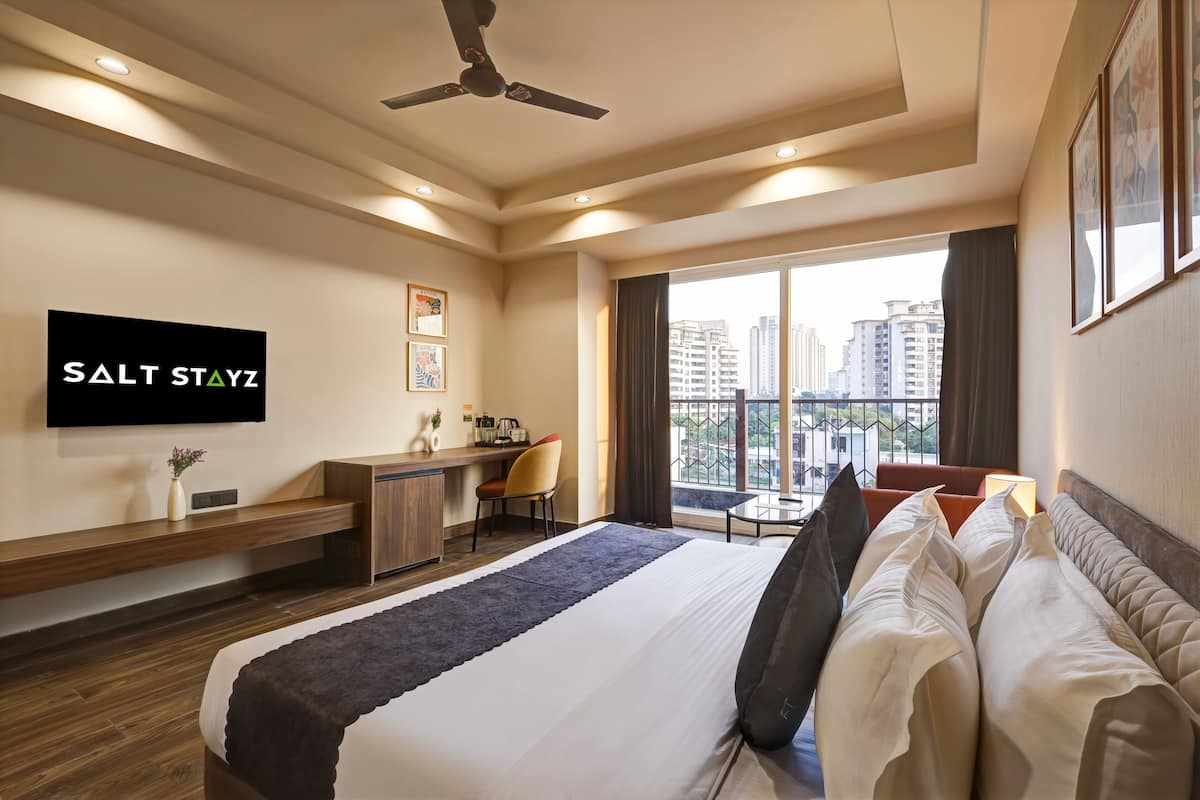 Superior Suite Balcony with City View | Desk, laptop workspace, soundproofing, iron/ironing board
