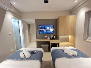 Deluxe kamer, 1 twee- of 2 eenpersoonsbedden, uitzicht op stad | Luxe beddengoed, bedden met traagschuimmatras, een minibar