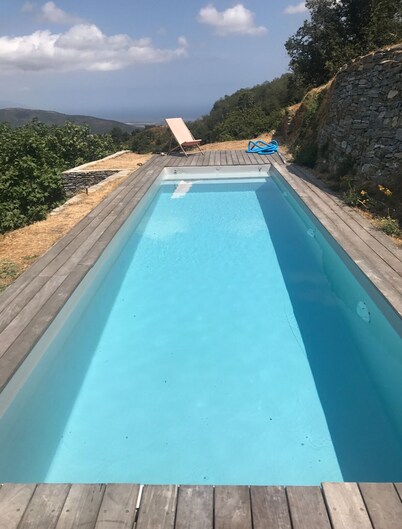 Typical village house with swimming pool and large garden with exceptional view