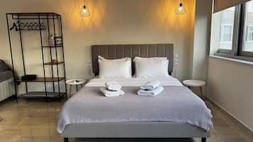 Apartment, City View | 1 bedroom, in-room safe, soundproofing, iron/ironing board