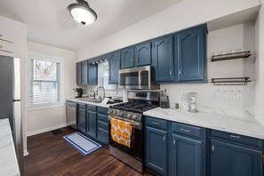 Fridge, microwave, oven, stovetop - Blue Haven Cottage | Spacious 2BD in the Heights (Peoria Heights)