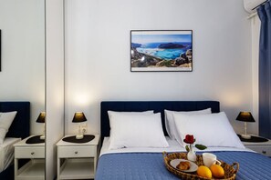 2 habitaciones, tabla de planchar con plancha y cuna de viaje