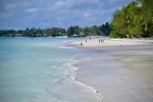 On the beach, white sand