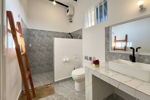 Deluxe Double Room, 1 King Bed, Ocean View | Bathroom | Shower, slippers, towels, soap