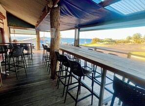 Outdoor dining - Spacious 5BR Retreat w/ Ocean Views, Sleeps 13, Walking distance to the Beach (Port Victoria)