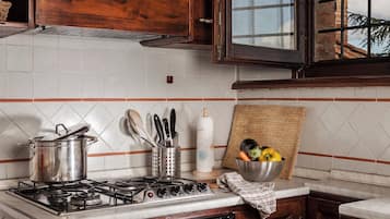 Comfort Condo, Garden View | Private kitchen | Electric kettle