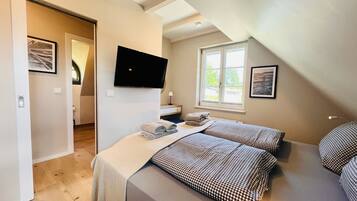 1 slaapkamer, een strijkplank/strijkijzer, gratis wifi