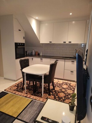 Private kitchen - Charming 1-bedroom apartment in nice Akershus with WiFi, AC at Hanaborg train s. (Akershus)