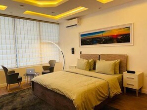 Economy Apartment, Balcony, City View | 2 bedrooms, desk, laptop workspace, blackout drapes - Smart Service Apartments (Abuja)