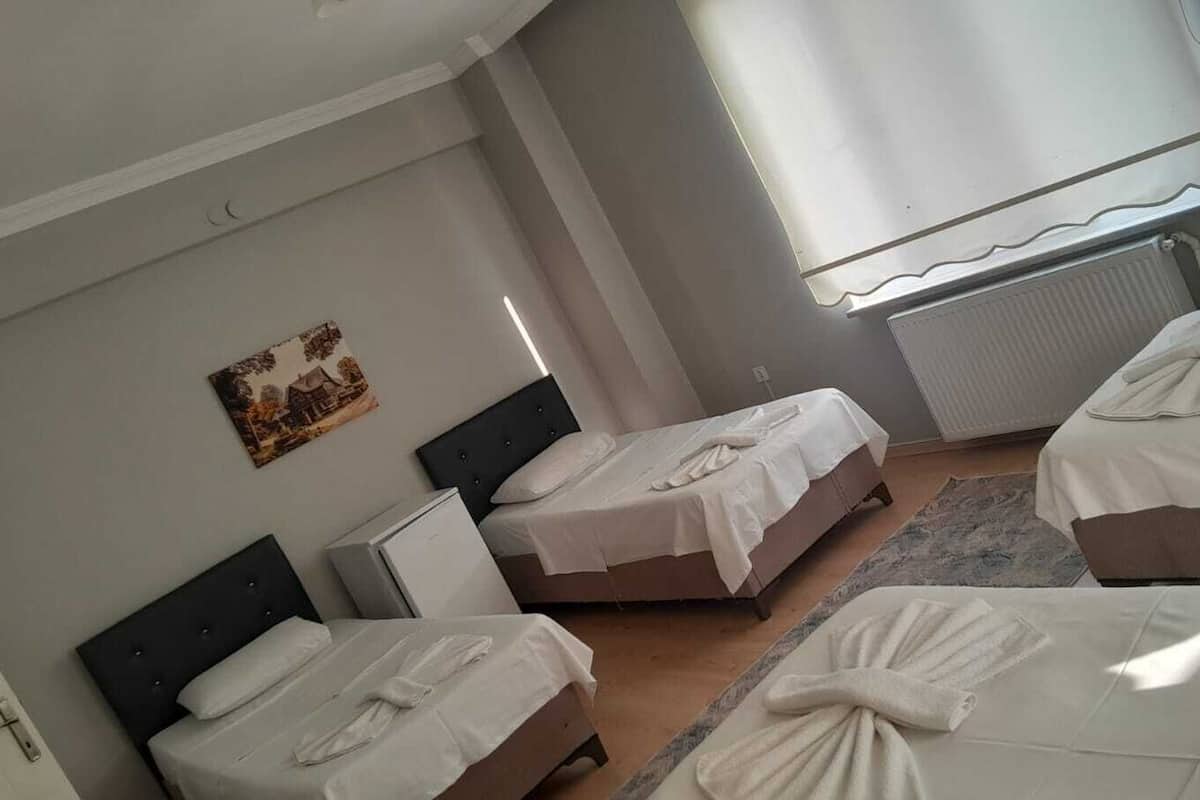 Deluxe Quadruple Room, Balcony, City View | Soundproofing, free WiFi