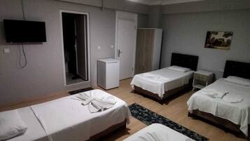 Deluxe Quadruple Room, Balcony, City View | Soundproofing, free WiFi