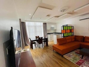 Family Apartment, Balcony, City View | Living area