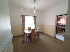 Family Apartment, Balcony, City View | Dining room
