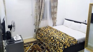شقة ديلوكس - بشرفة - منظر للمدينة | 2 عدّة غرف نوم وخزنة داخل الغرفة ومكتب ومساحة عمل للكمبيوتر المحمول