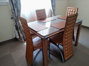 Deluxe Apartment, Balcony, City View | In-room dining