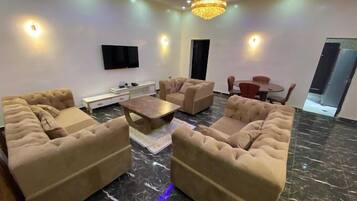 Family Apartment, Balcony, City View | Living area