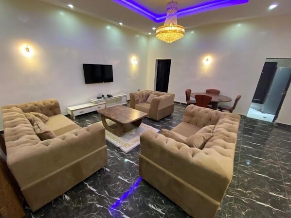 Family Apartment, Balcony, City View | Living area