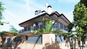 A modern two-story building with a flat roof, large windows, and a balcony. - Gregal - Aparthotel with Swimming Pool (Vilassar de Mar)