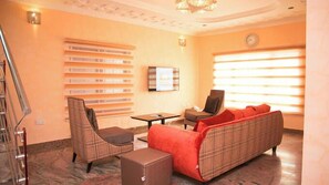 Economy Apartment, Balcony, City View | Living area - Noktel Apartments (Abuja)