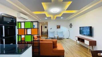 Apartemen Deluks, balkon, pemandangan kota | Area keluarga