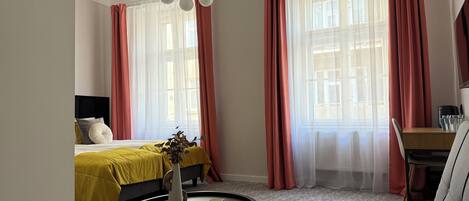 Chambre quadruple Deluxe | Fer et planche Ă repasser, accĂšs au Wi-Fi (inclus)