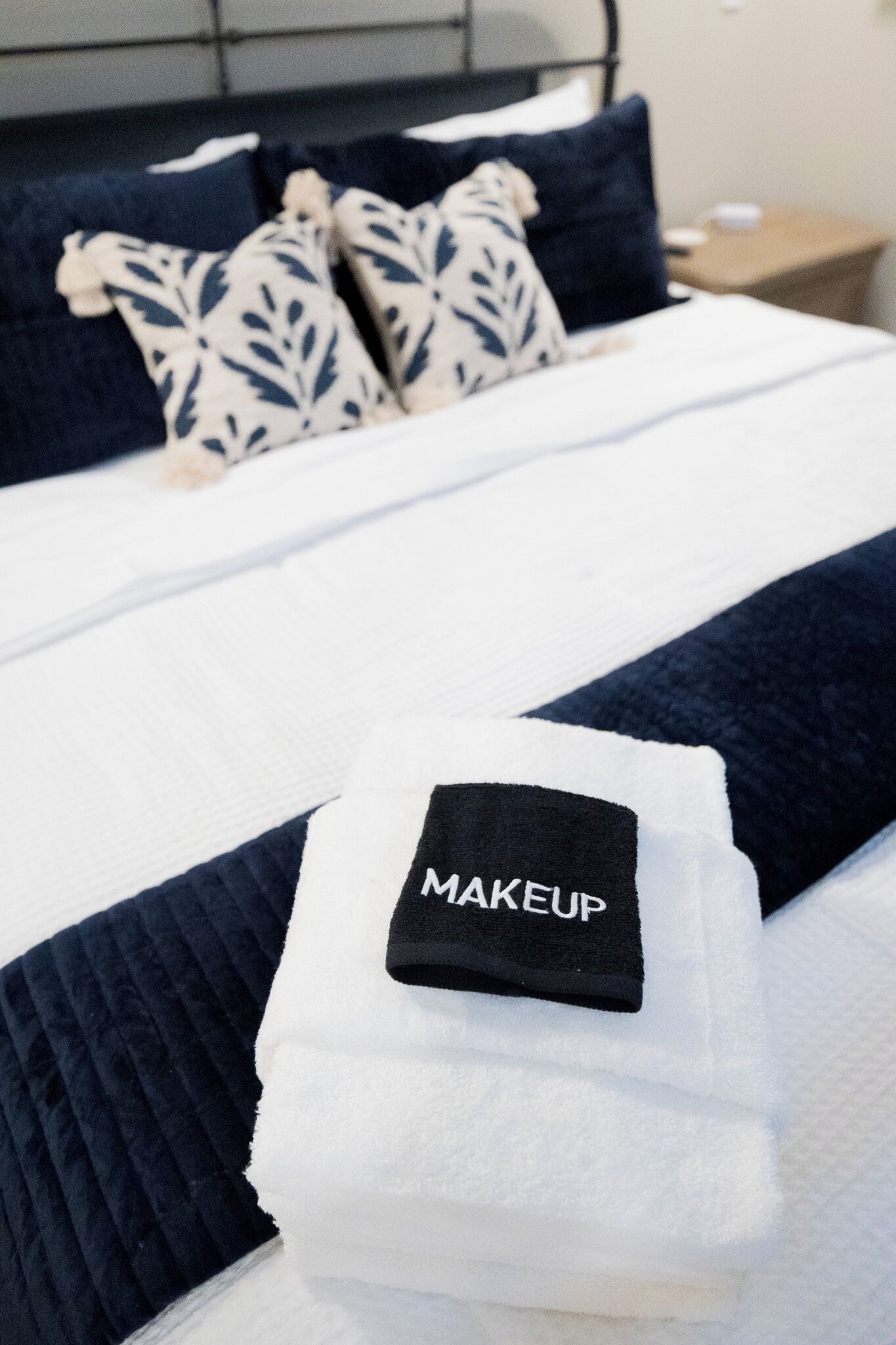 - Striking navy and cream throw pillows add a burst of style and texture to the bed - Layers of plush comfort make this the coziest spot to curl up and relax - Every detail, from the stitching to the palette, whispers calm and comfort