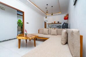 Family Villa, 2 Bedrooms, Pool View | Living area | 43-inch LED TV with satellite channels, Netflix, streaming services - Made Ubud Villa (Ubud)