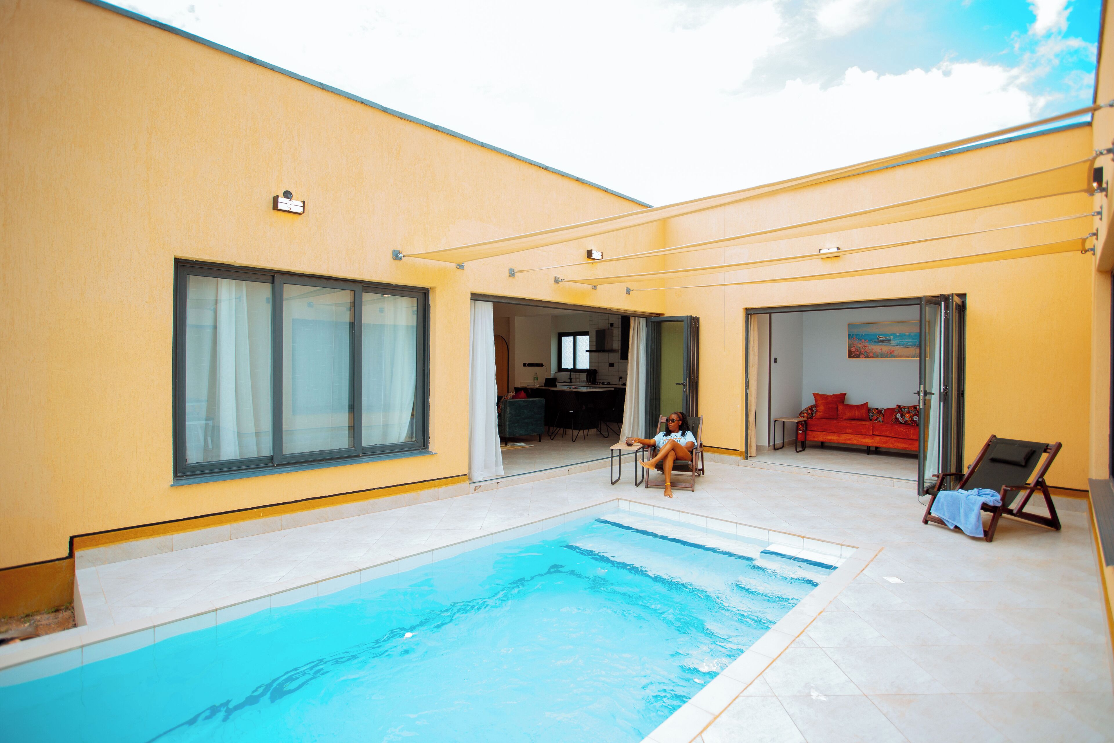 Outdoor pool, a heated pool, pool loungers