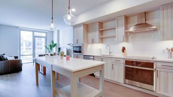 Apartment, City View | Private kitchen | Coffee/tea maker, blender, toaster oven, cleaning supplies