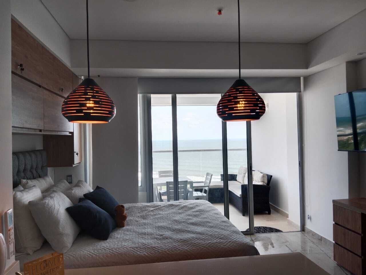 Estúdio, vista para a praia | Camas Select Comfort, cofres nos quartos, individualmente decorados