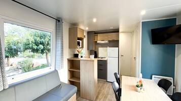 Family Mobile Home, 3 Bedrooms, Air conditioning | Living area | 80-cm LCD TV with digital channels